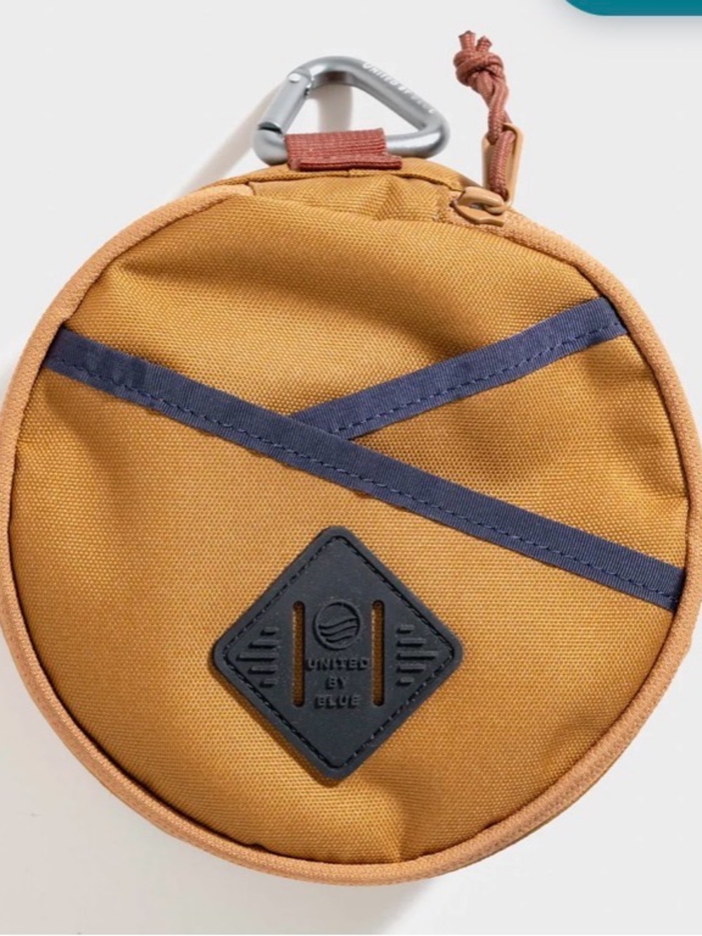 United By Blue Men's Round Utility Pouch in Mustard w  blue trim.